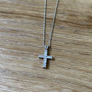 Authentic platinum + diamond cross necklace